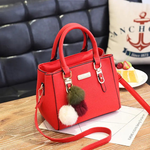 Elegant Women's Handbag with Pom - Shoulder and Crossbody Bag