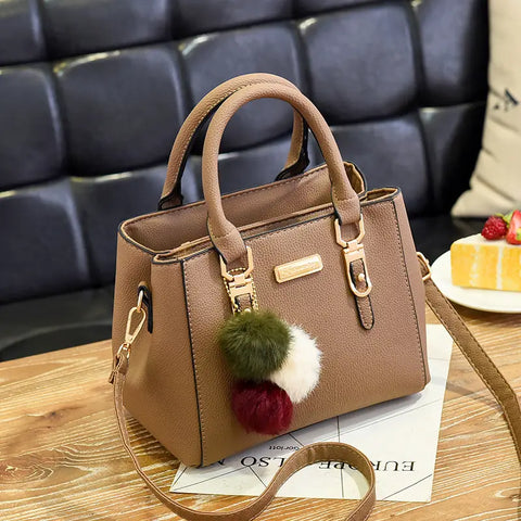Elegant Women's Handbag with Pom - Shoulder and Crossbody Bag