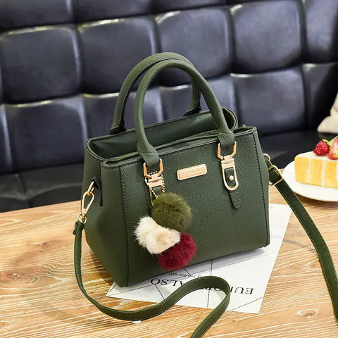 Elegant Women's Handbag with Pom - Shoulder and Crossbody Bag